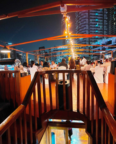 A rooftop restaurant in the evening